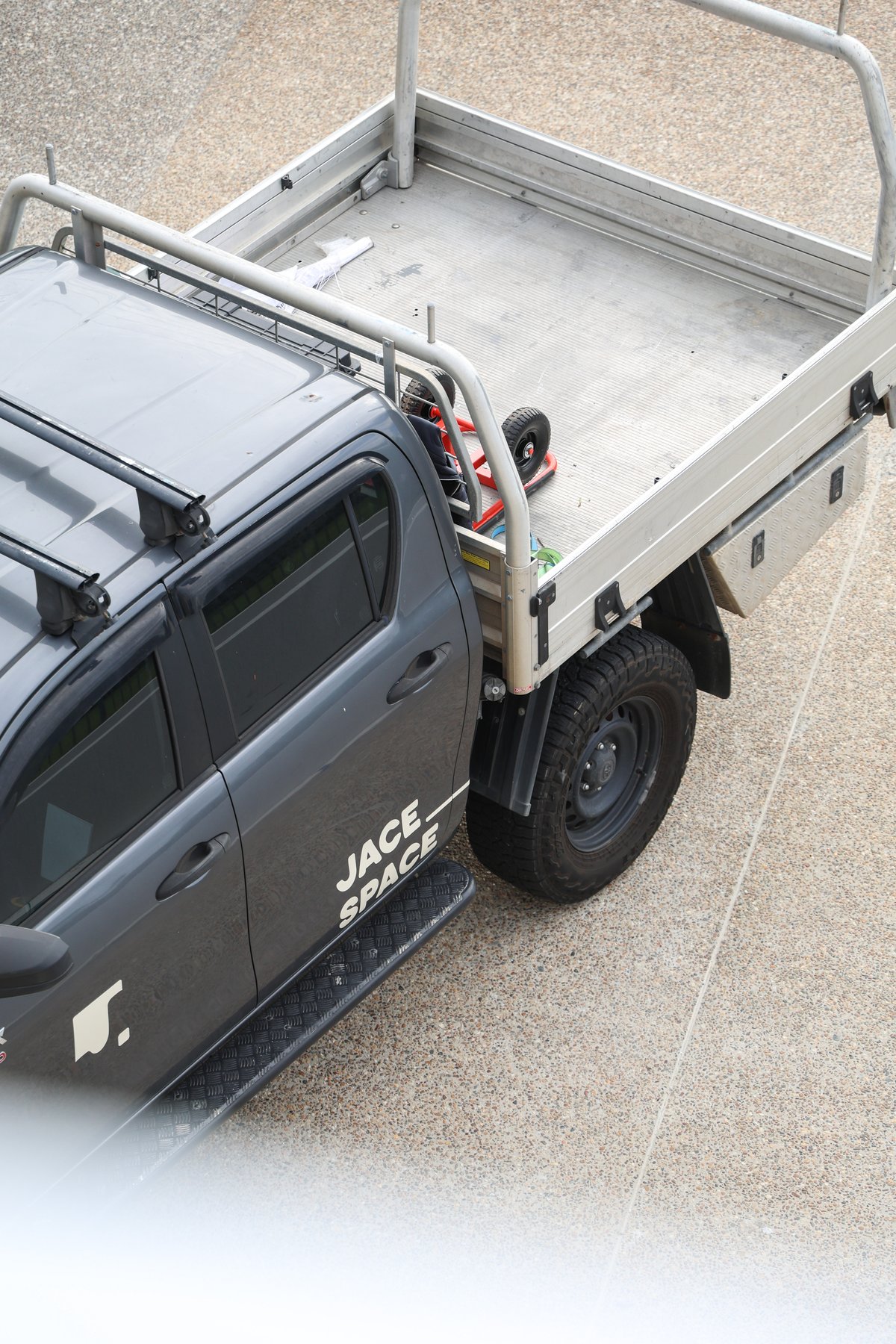 Aerial view of a Jace Space work ute loaded and ready for site